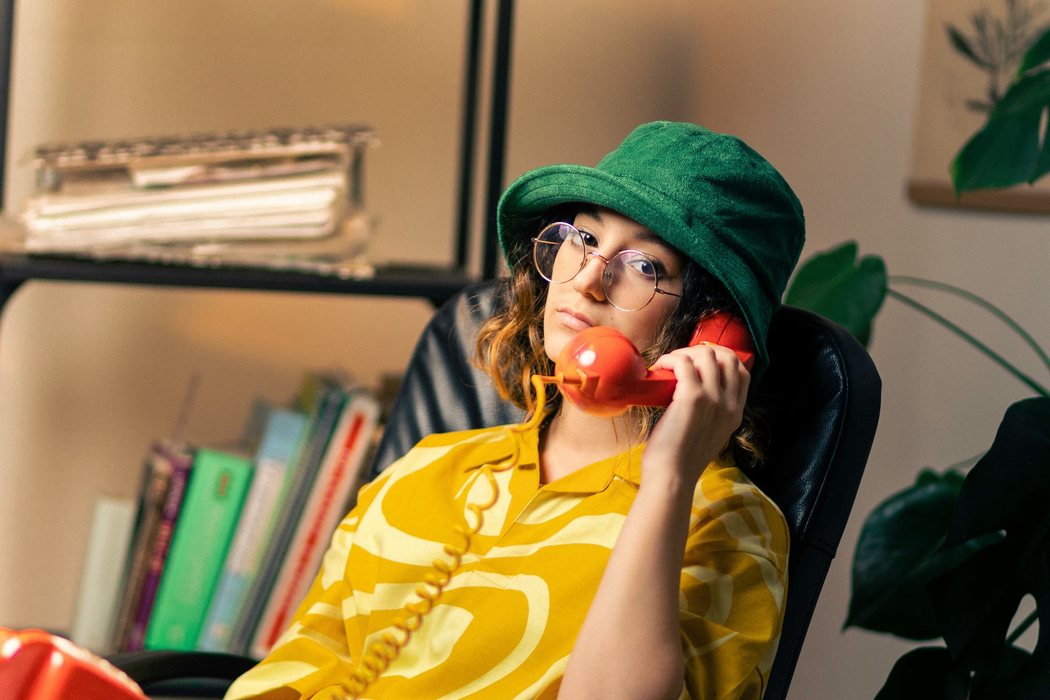 A sales rep on a call, headset to ear